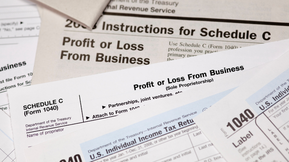 A close-up of a Schedule C Profit or Loss from Business 1040 Form.